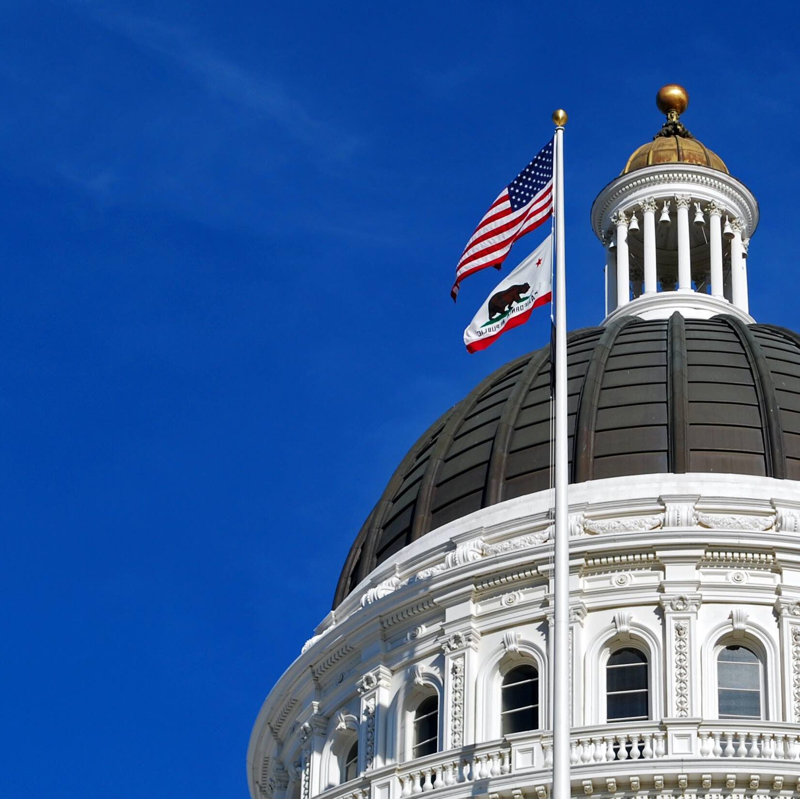 California capitol with flags